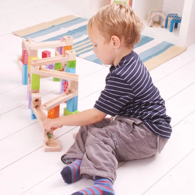 Bigjigs Toys Piste de billes en bois colorée