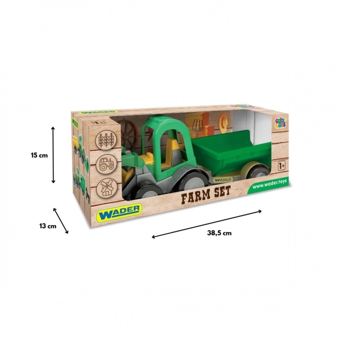 Tracteur avec chargeur et remorque Wader