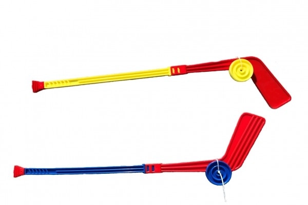 Bâton de hockey en plastique avec palet 74cm mélange de couleurs