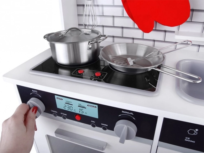 Grande cuisine en bois avec lumières et sons