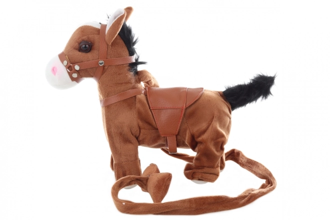 Cheval en peluche qui marche avec des sons