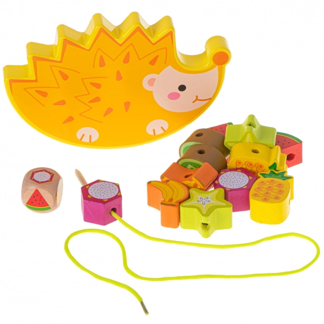 Jeu de laçage en bois avec hérisson et fruits