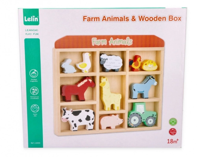 Ensemble d'animaux de ferme en bois dans un cadre