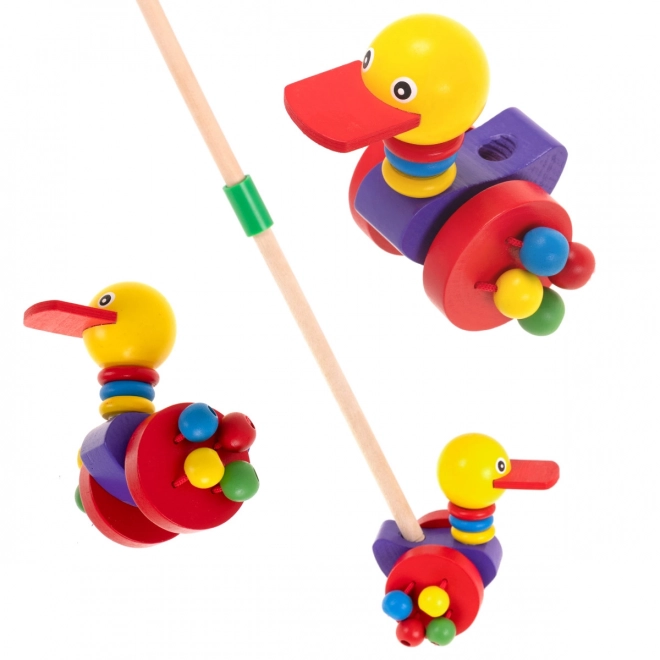 Canard en bois marchant sur bâton