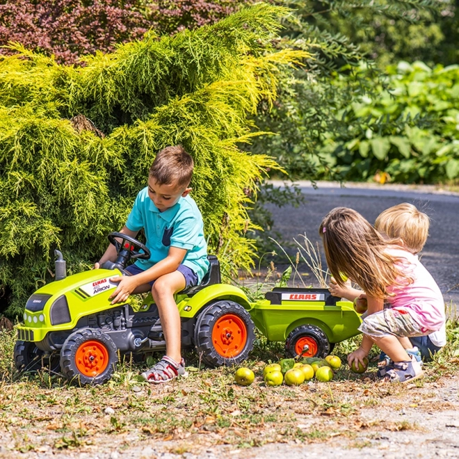 Tracteur à pédales Claas Arion 410 avec remorque