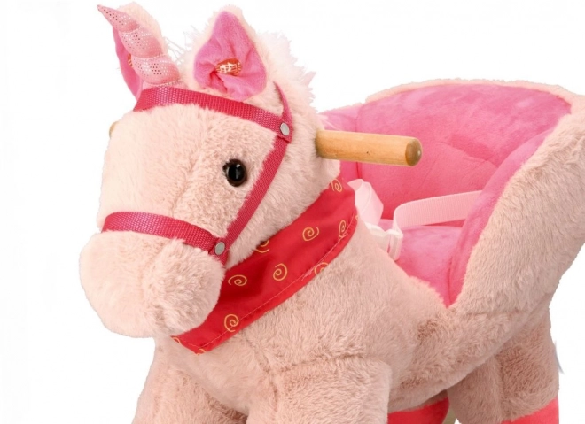 Licorne rose avec siège auto