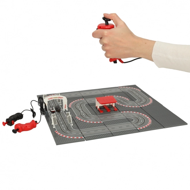Piste de course de police électrique avec blocs de construction