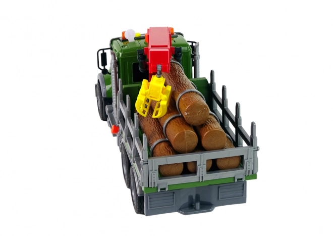 Véhicule de jeu avec grue pour le transport de bois