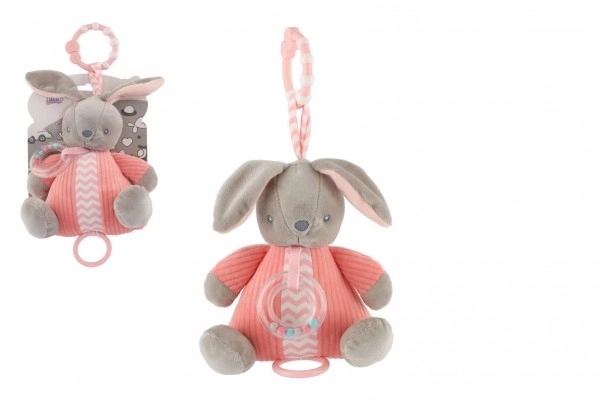 Lièvre musical à remonter avec hochet en peluche 18x20cm rose sur carte en sachet 0+