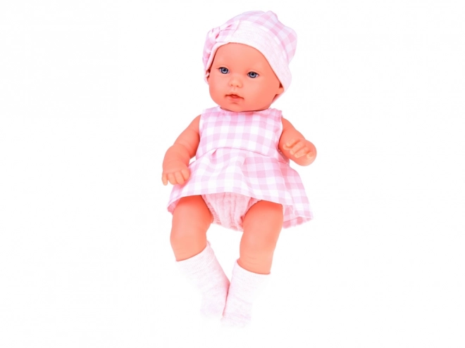 Poupée en tissu bébé nouveau-né avec bonnet rose