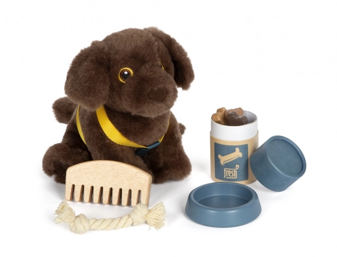 Petit chien en peluche avec set de soins