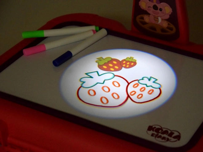 Projecteur pour enfants dans une mallette rose