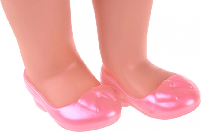 Membres articulés et chaussons roses