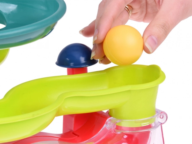 Piste interactive avec balles mobiles