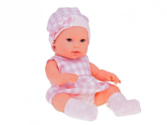 Poupée en tissu bébé nouveau-né avec bonnet rose