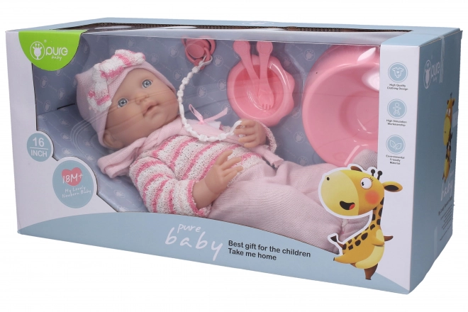 Bébé en barboteuse rose 40 cm