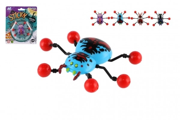 Araignée en plastique rampant sur verre 8x6cm 4 couleurs sur carte