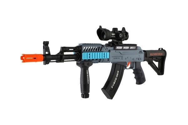 Fusil mitrailleur avec balles en mousse + 12 balles plastique 60cm sur batterie avec lumière, son dans une boîte 65x27x6cm