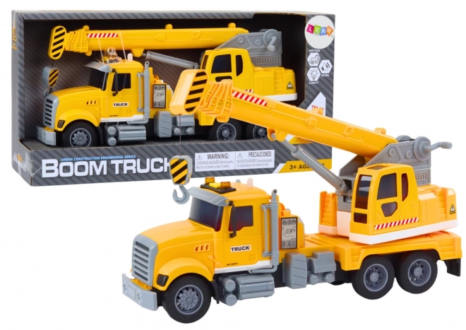 Grue de chargement jaune avec entraînement à friction et effets lumineux et sonores
