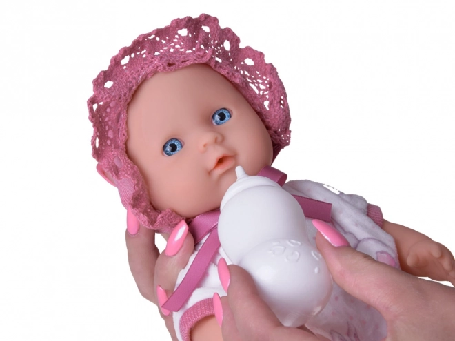 Poupée bébé avec porte-bébé