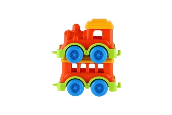 Petit train en plastique avec wagon