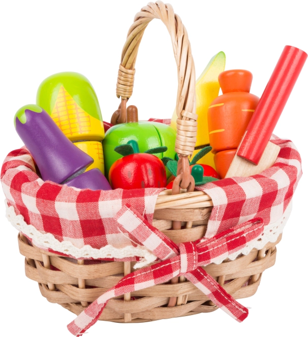 Panier en osier réaliste avec aliments en bois