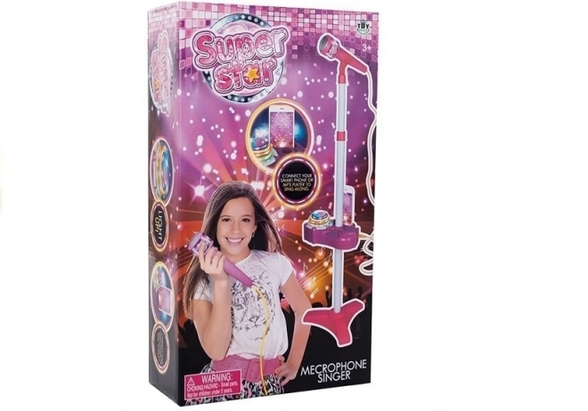 Ensemble rose avec microphone, trépied et projecteur