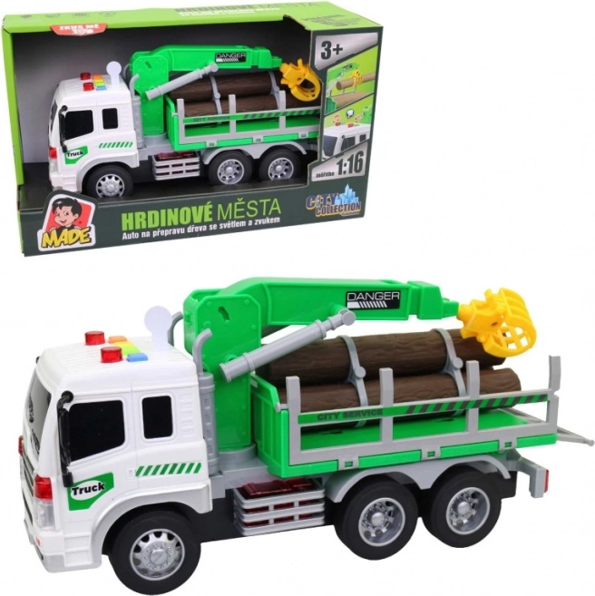 Camion de transport de bois avec bras élévateur et effets lumineux