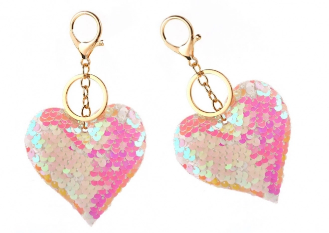 Pendentif en forme de cœur avec des paillettes réversibles