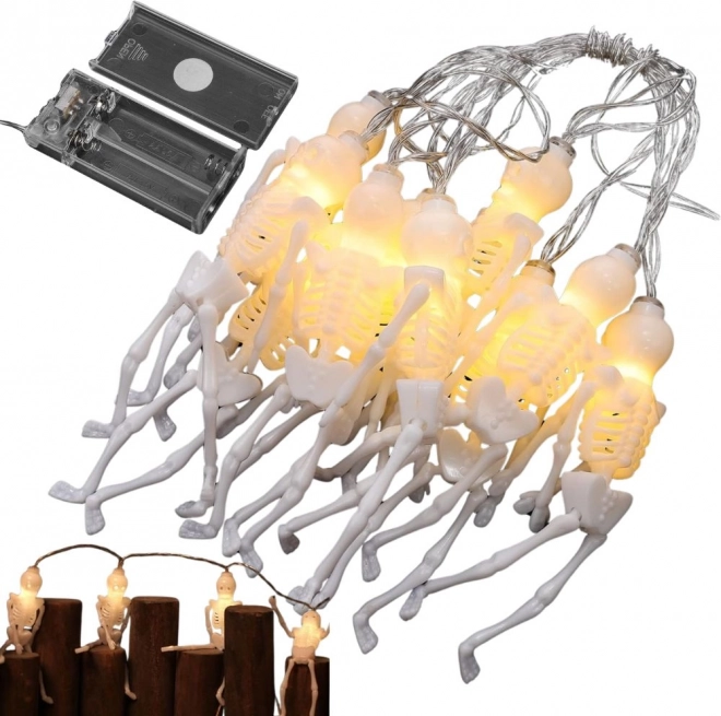 Guirlande lumineuse LED Halloween squelettes 2 m, 10 pendentifs, blanc chaud