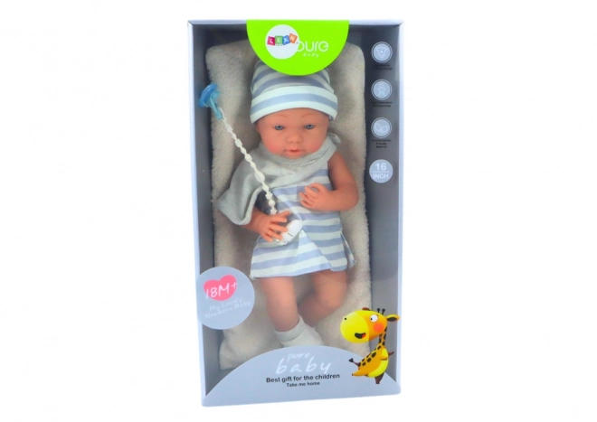 Poupée Bébé en Vêtement Blanc-Bleu avec Bonnet et Tétine