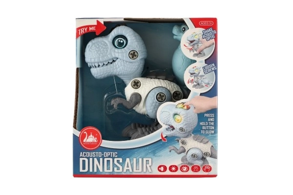 Dinosaure à visser en plastique 12 cm avec tournevis fonctionnant sur piles avec lumière et son dans une boîte 15x16x7 cm