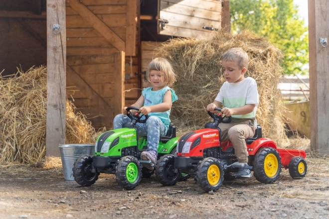 Tracteur à pédales avec remorque rouge