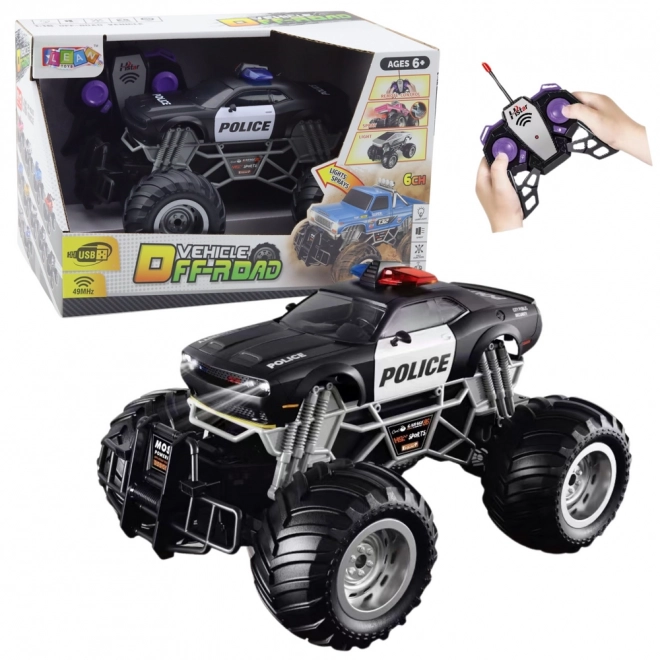 Voiture tout-terrain de police télécommandée 1:16 avec lumières et fumée