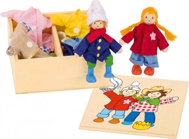 Poupées habillables dans une boîte