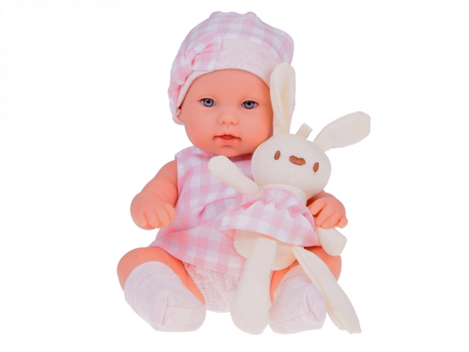 Poupée en tissu bébé nouveau-né avec bonnet rose