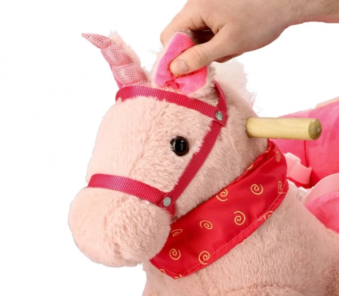 Licorne rose avec siège auto