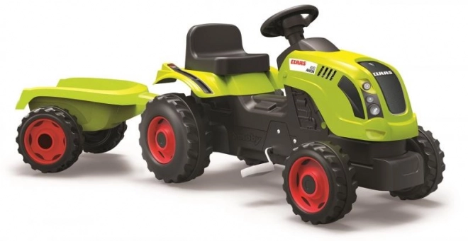 Tracteur à pédales CLAAS Arion 400 avec remorque verte