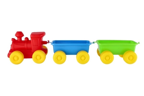 Train + 2 wagons en plastique 60 cm dans un filet
