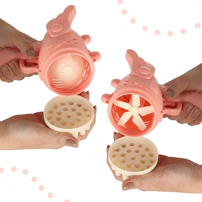 Pistolet à bulles rose avec ailes