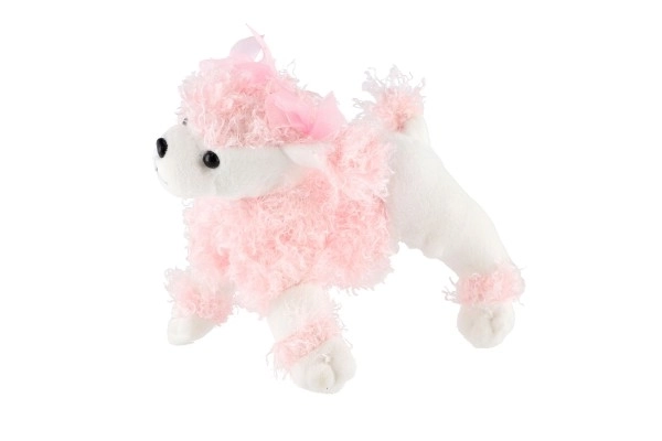 Caniche en peluche rose dans un sac à main