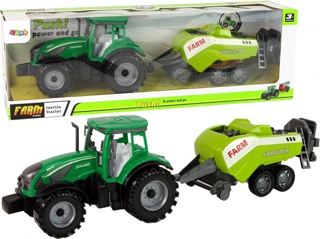 Tracteur vert avec faucheuse à inertie
