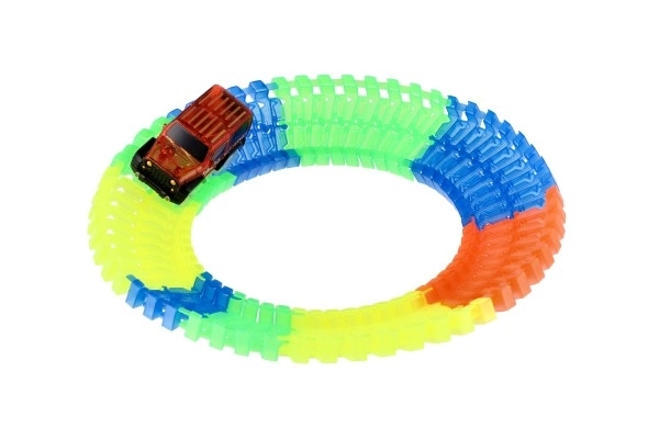 Circuit lumineux dans le noir + voiture à piles en plastique 57 pièces longueur 72cm sur carte 17x24x7cm