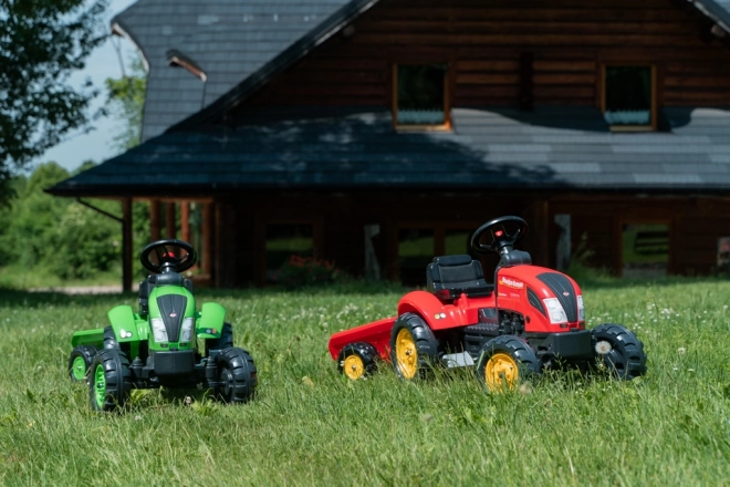 Tracteur à pédales avec remorque rouge