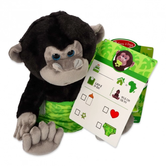 Nourrir le bébé gorille en peluche