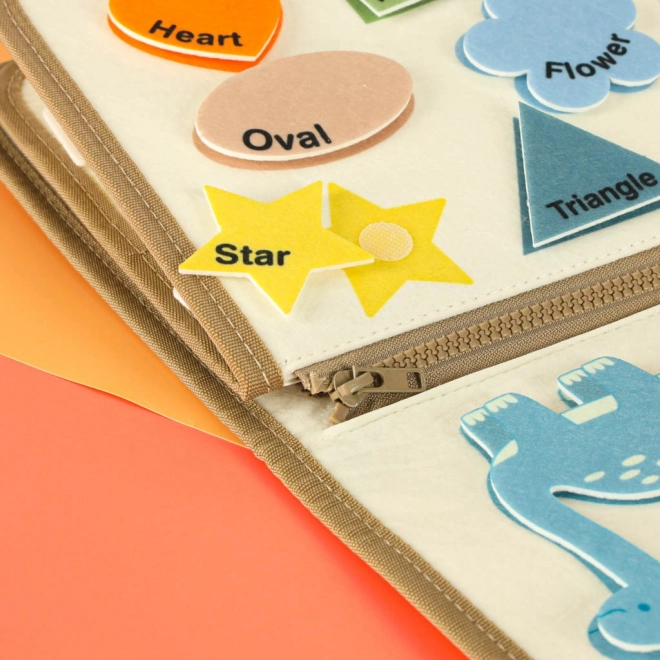 Valise sensorielle Montessori avec dinosaures