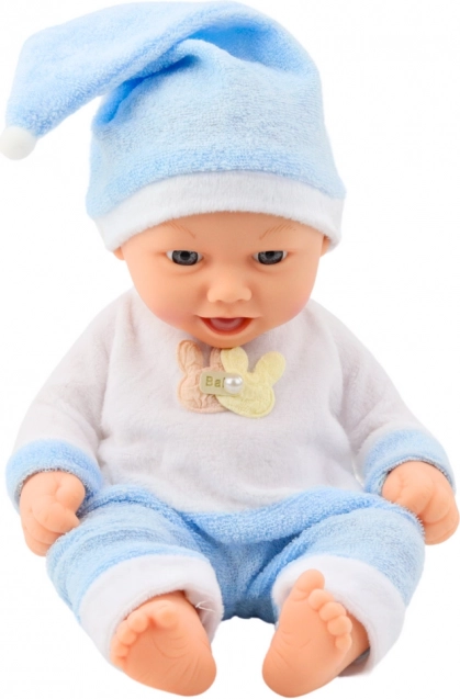 Poupée bébé en pyjama bleu avec bonnet à pompon