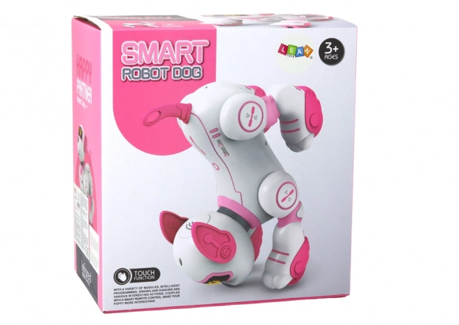 Chien robot interactif dansant télécommandé rose