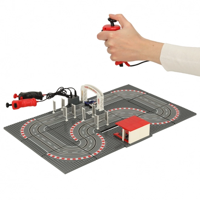 Piste de course policière électrique avec voitures et blocs de construction