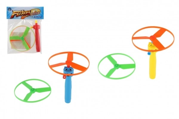 Toupie à élastique + lanceur plastique 9cm 2 couleurs en sachet